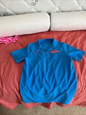Nike Bright Blue Polo with Red Accent Logo